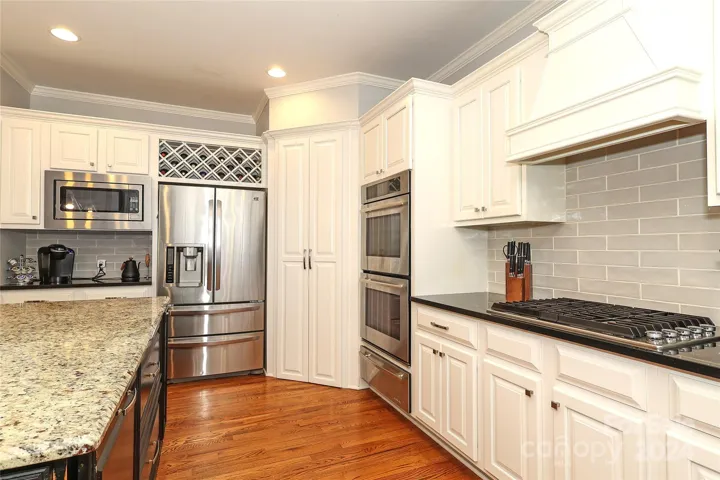 Kitchen--wood floors and Granite