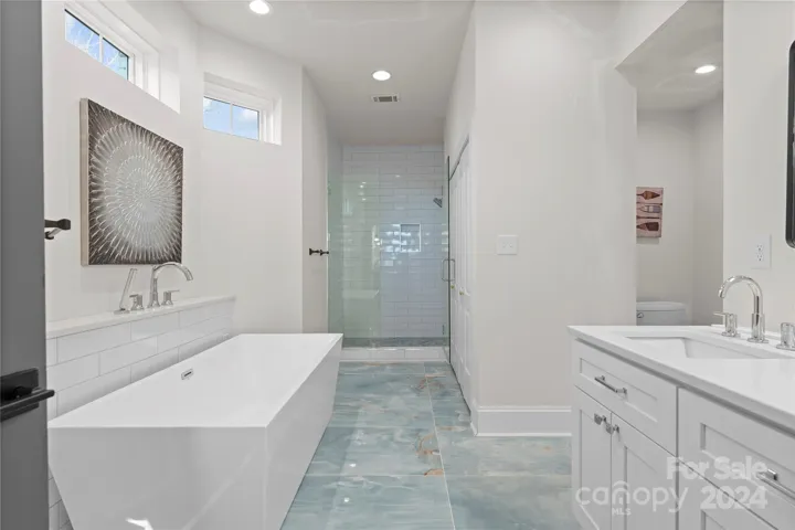 Lower level bedroom en-suite with W/D hookup