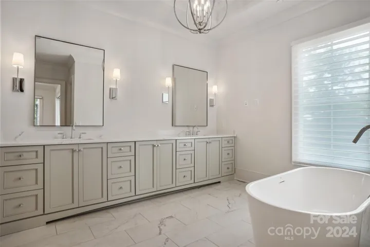 Double vanity and soak tub in Primary Bathroom/ Ensuite