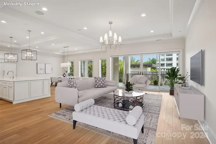 staged Living/ Dining and Kitchen off the Lanai over looking pool