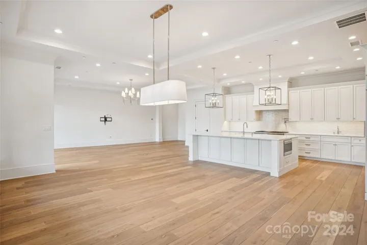 From Corner of Dining Area looking at large Open Concept Living, Dining and Kitchen