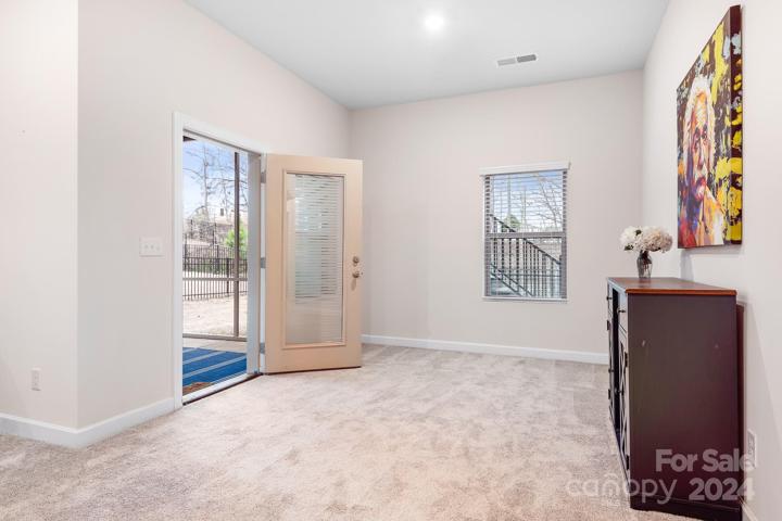 Basement exterior entrance onto screened porch.