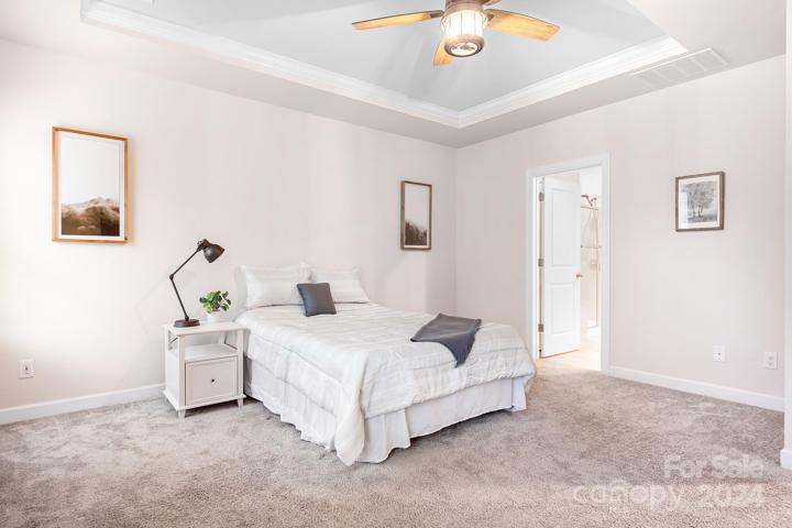 Elegant Primary with gorgeous ensuite.