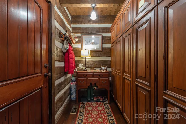 Log home beautifully constructed  with gorgeous wood finshes including walnut doors
