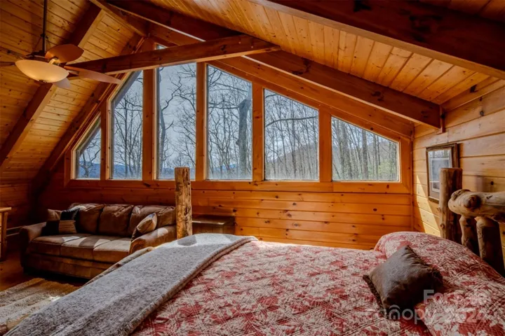 Upper level bedroom with lots of natural light