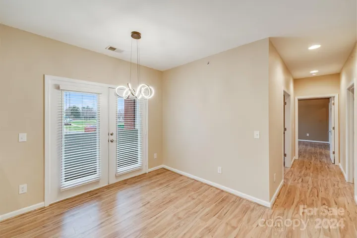 Dining Room with French Doors out to the balcony