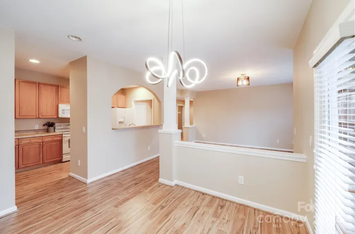 Dining room looking into kitchen.