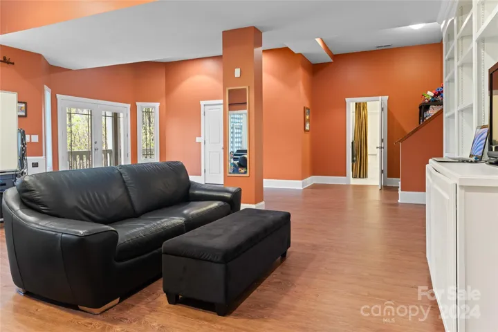 Utilize the lower level finished living space for guest overflow, gym, office, studio or recreation room