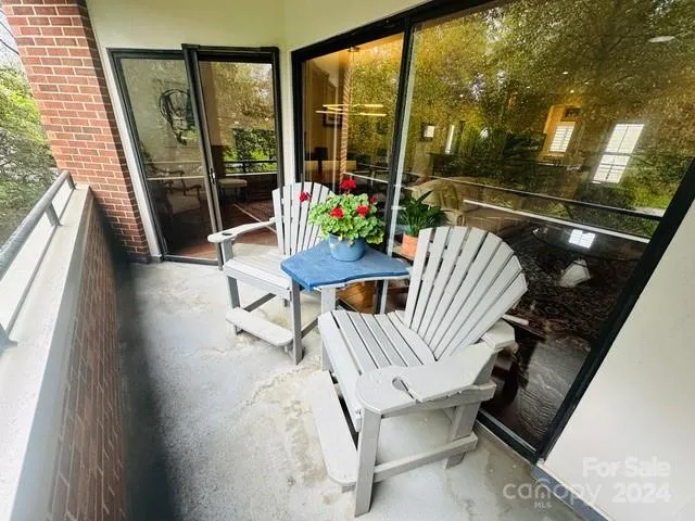 The balcony has two sets of sliding doors that allow a great flow into the living area.