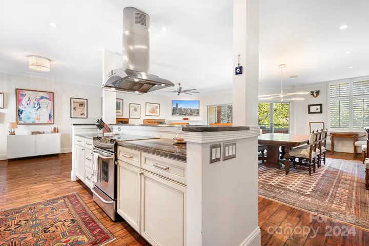 The spacious kitchen has a large island/bar.