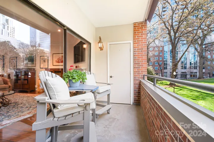 The balcony is spacious and has a storage closet.