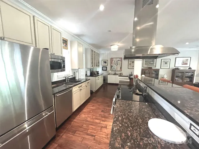 There is plenty of cabinet and counter space in the kitchen.