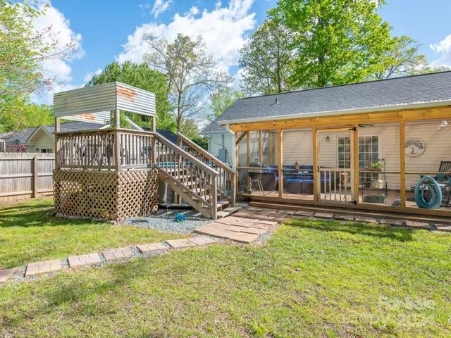Backyard w/ porch & pool deck