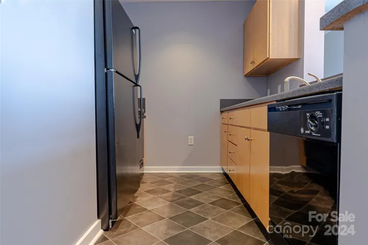 Breakfast bar and kitchen are immediately off the living area. Great area to enjoy your meal and the views.