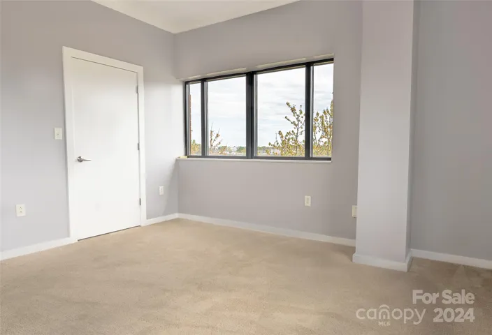 Spacious and open with a nice sized closet and more natural light streaming in from the other side.