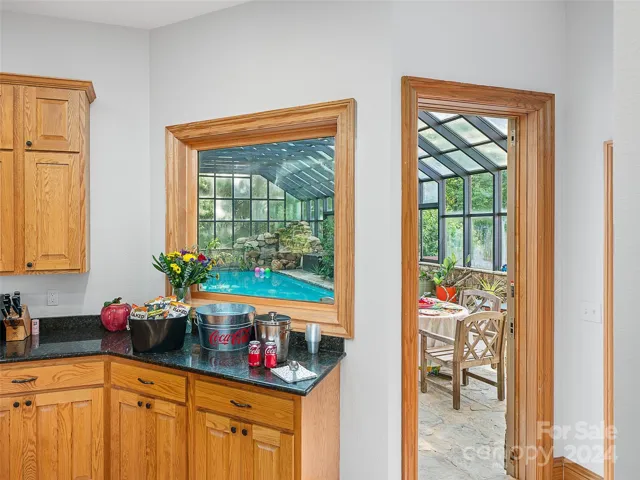 Kitchen Opening into pool area from Entertaining Convenience