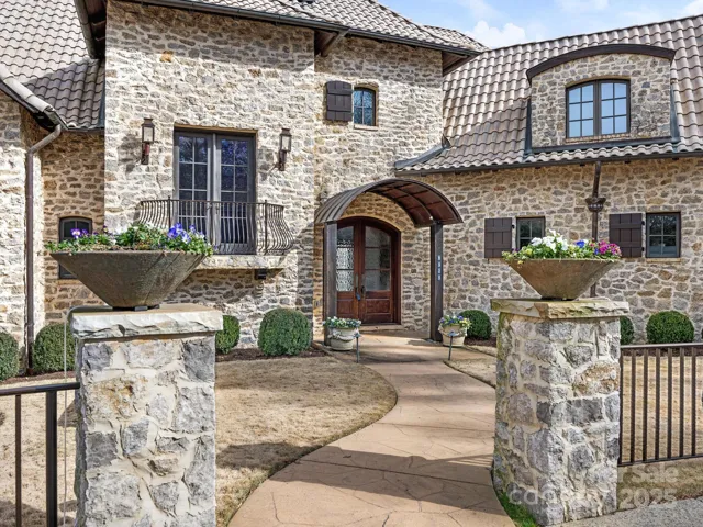 Welcome home to the Exclusive Seven Eagles Community and to your own custom solid stone home!