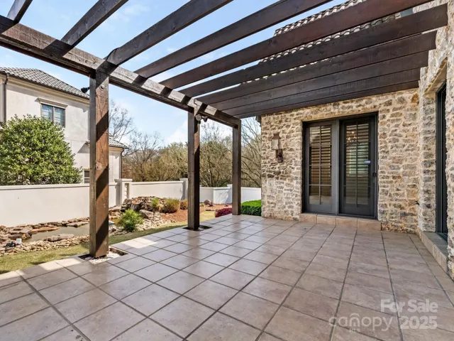 Rear patio overlooking the koi pond and waterfall