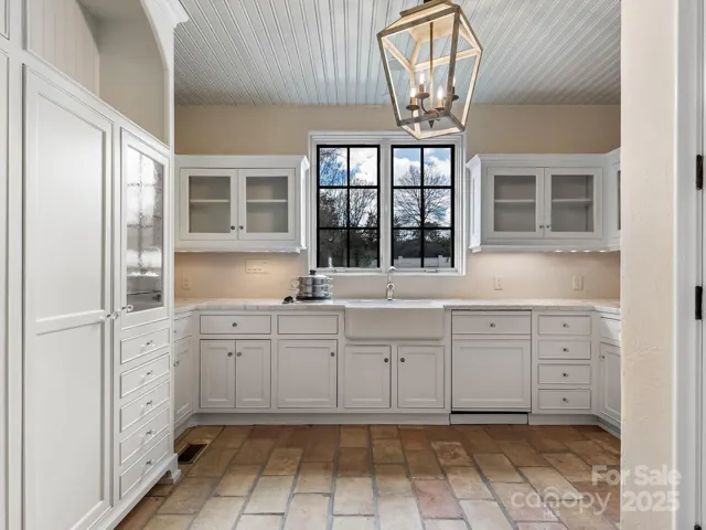 Scullery and pantry as you enter from garage.