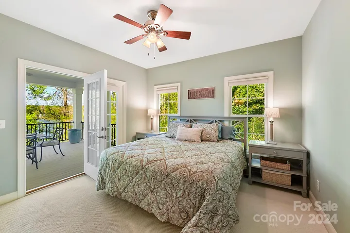 Main level bedroom with porch