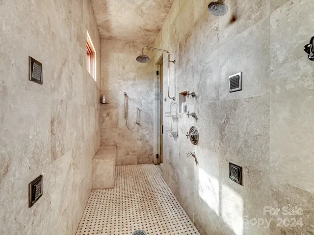 Such a beautiful shower space.  Seller added doors for additional warmth and comfort