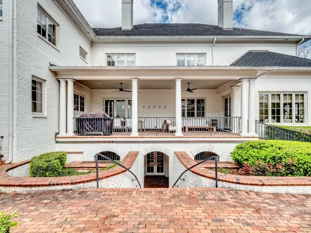 Upper and lower terrace as well as master bath entry to the outdoor living.