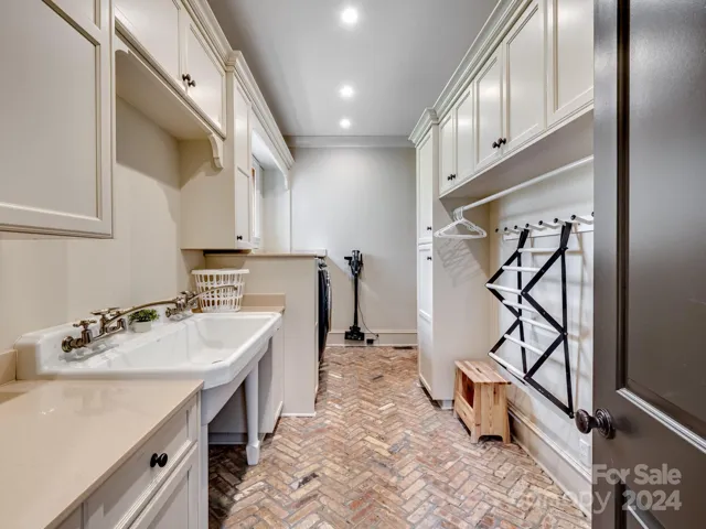 Plenty of space for hanging and storage and sink for delicates OR dogs!