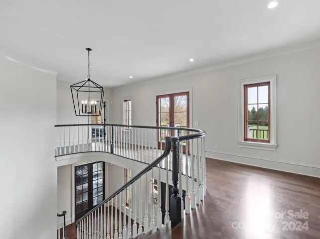 Upper floor and staircase.