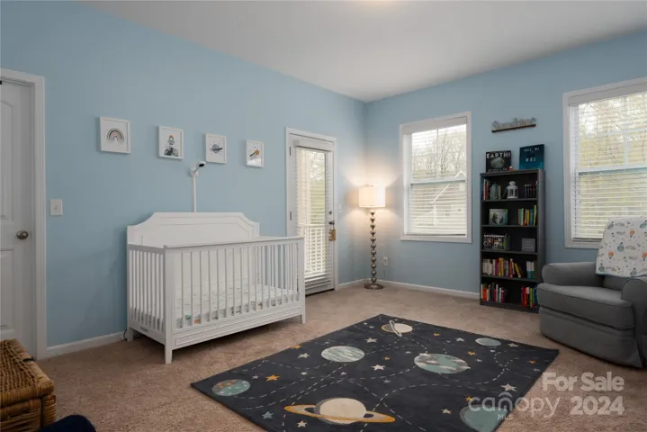 Large bedroom two, upstairs with huge walk in closet and private balcony.