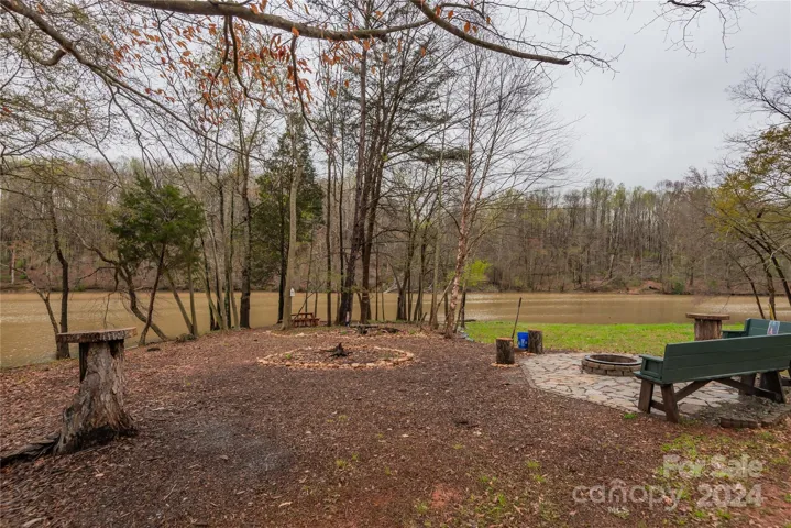 Just across he street from community firepit and recreation.