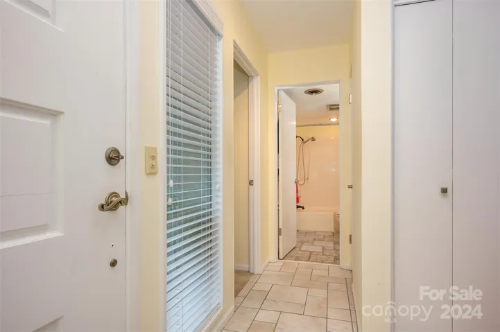 Foyer looking towards hall bathroom