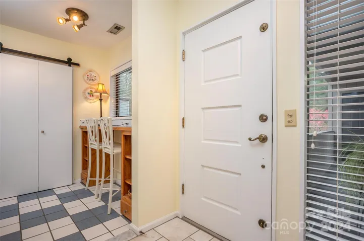 Front door entry into unit.  Breakfast or office area