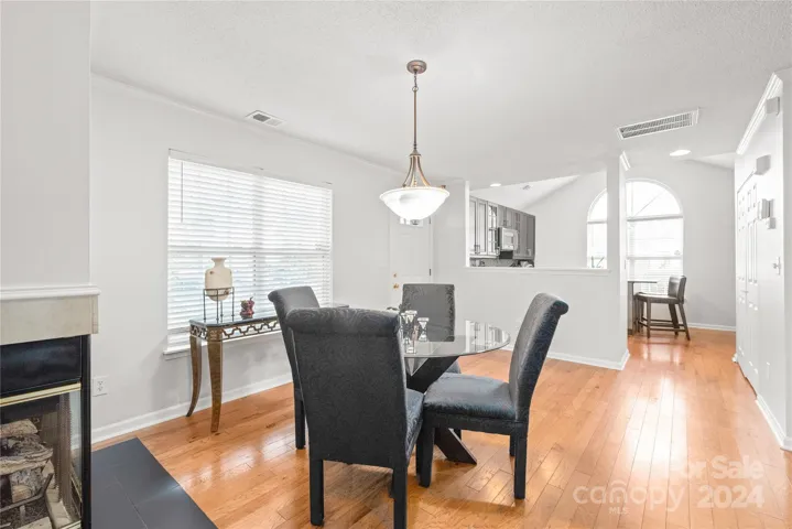 Breakfast room located off the renovated chef's kitchen with hardwoods and natural light.