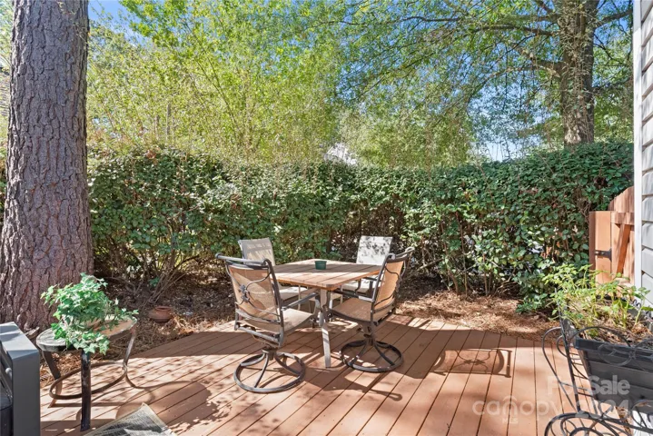 Private outdoor space surrounded by mature landscaping and perfect for entertaining.