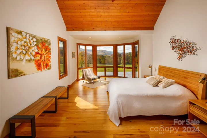 Primary Bedroom with private balcony