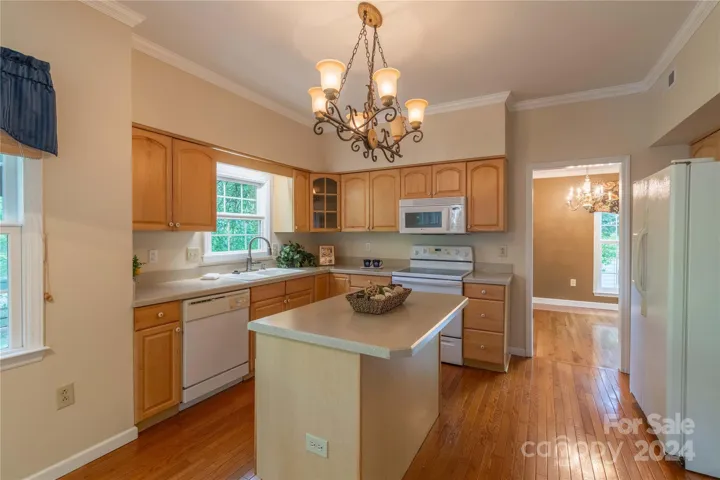 Kitchen has center island /breakfast bar