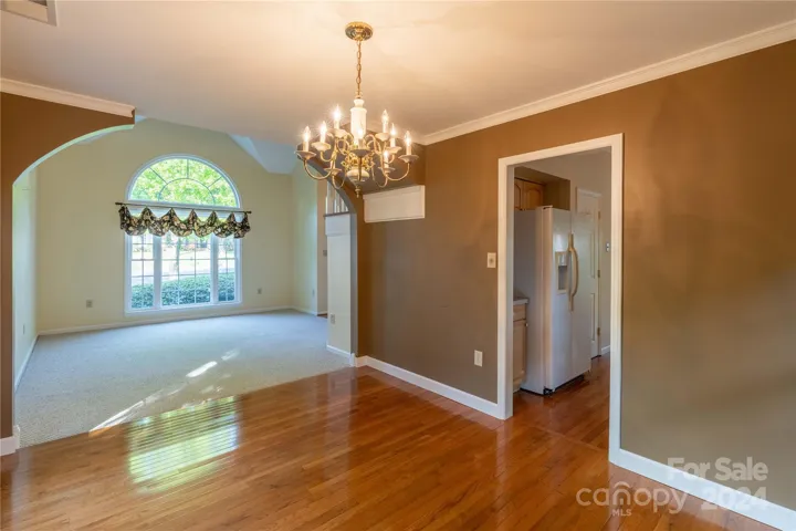 Living and dining rooms are open to each other