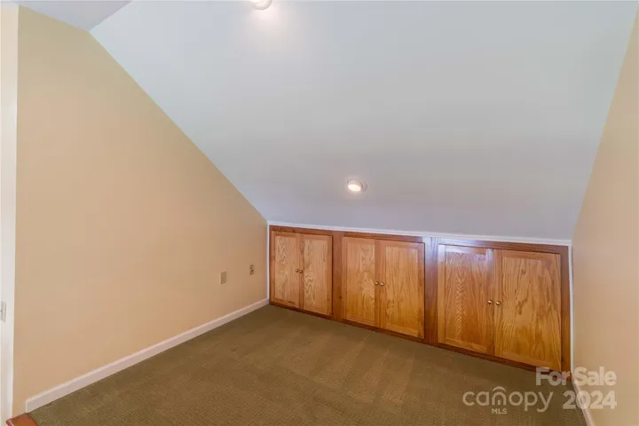 Loft is perfect office or play area.