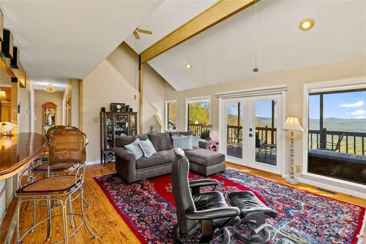 Mountain views fill the windows in the living room.