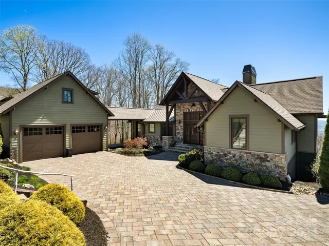 Classic Approach With Brick Paver Drive