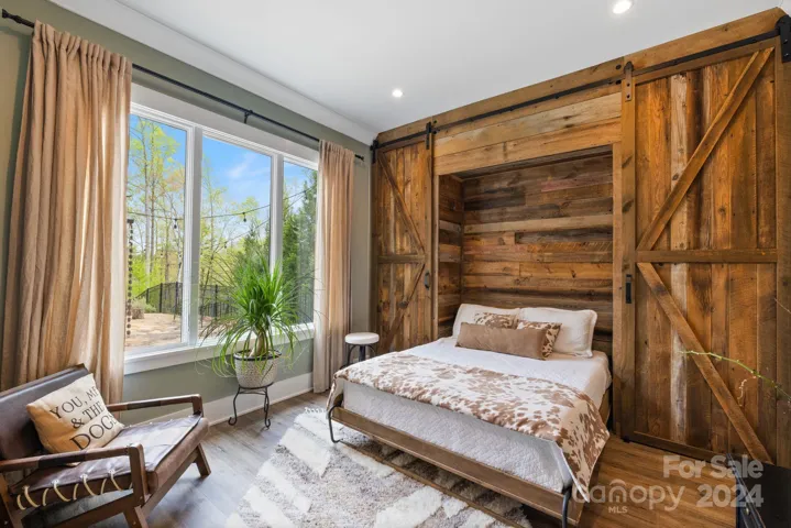 Main Level Bedroom with Ensuite Bath and WIC