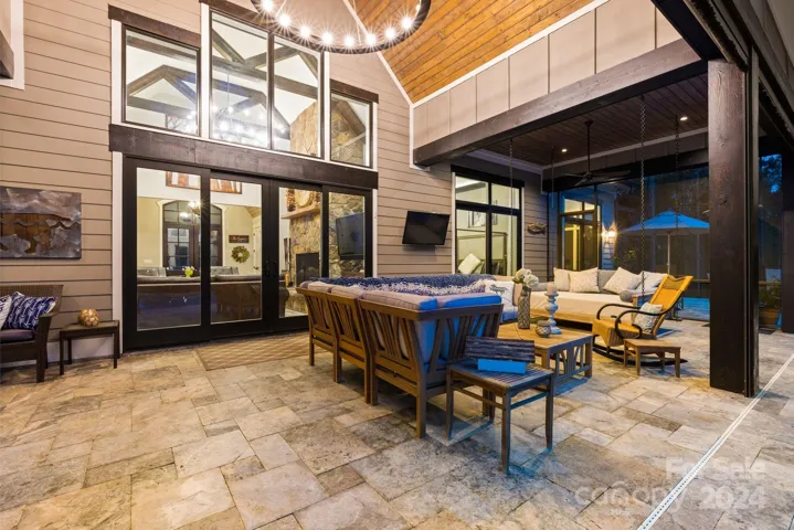 Covered Porch Lounge Area with Access to Family Room