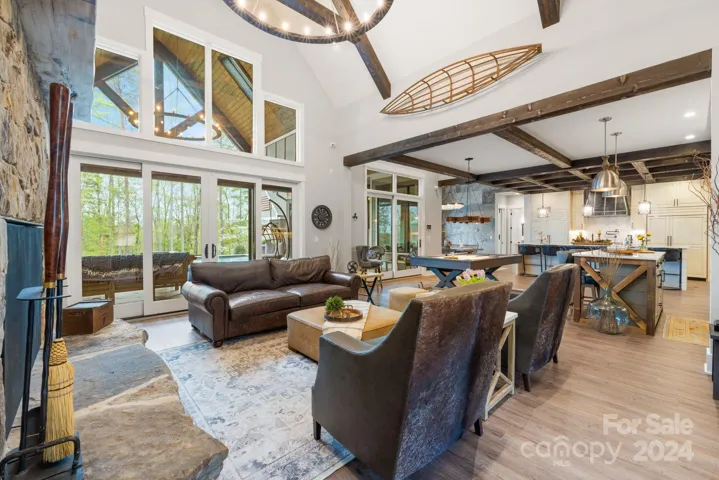 Open Family Room with Vaulted Ceilings & Wood Beams