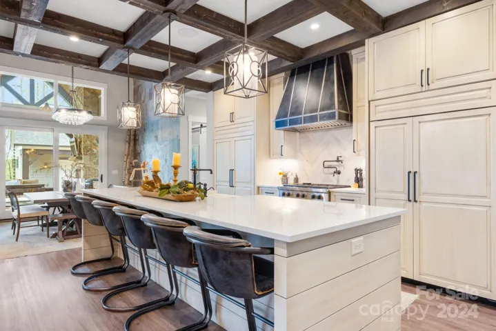 Kitchen with Custom Island and Access to Dining Area