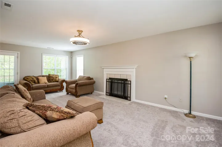 Great Room with Fireplace and Custom Ceiling Fan