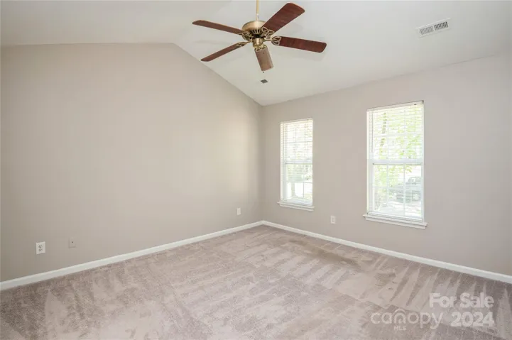 Primary Bedroom with Vaulted Ceiling