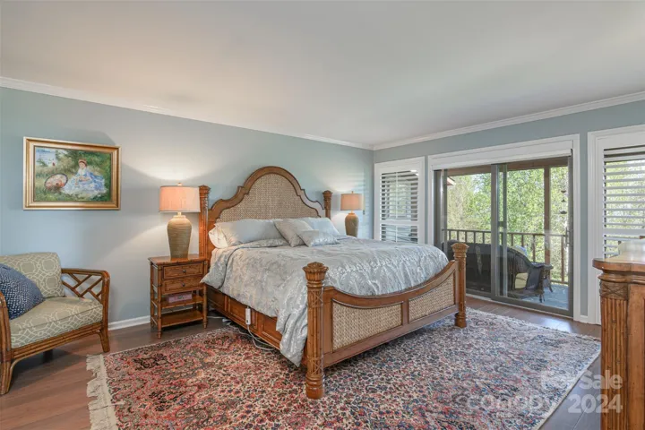 Primary w/Plantation Shutters & Walk-out to the Porch