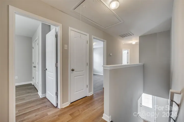 Upstairs Hall with attic pulldown stairs.