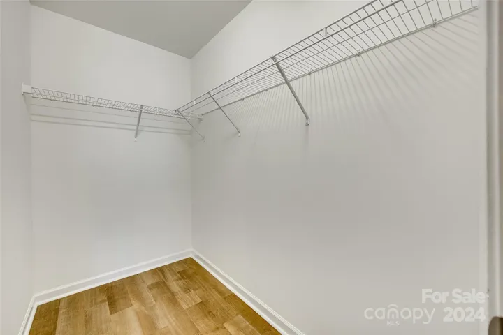 Primary Suite walk-in closet.