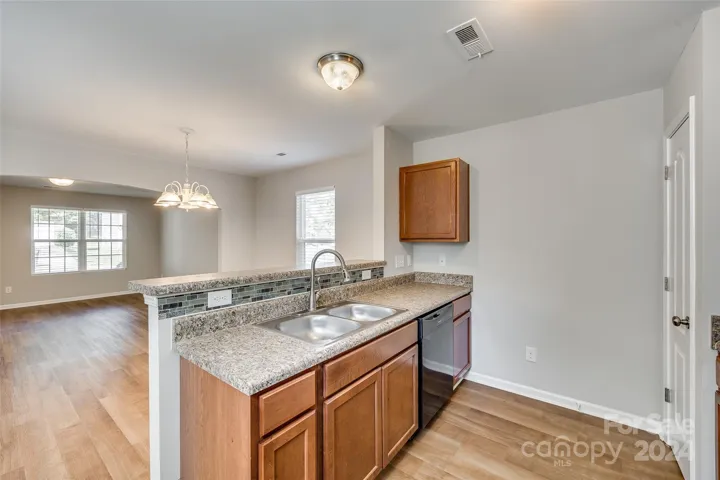 View of Dining and Great Room from the Kitchen.